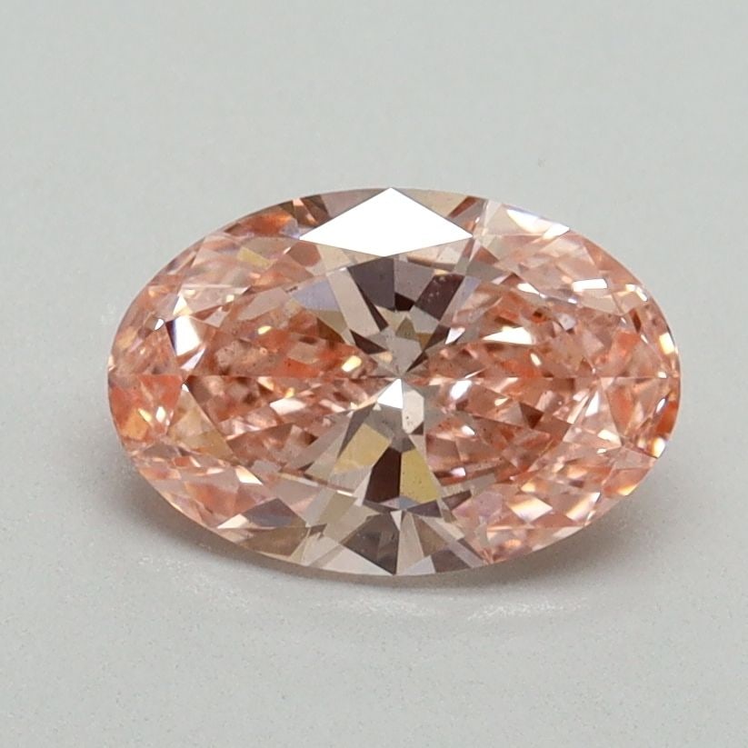 Loose Diamond - OVAL 1.01ct Fancy Vivid Pink VS2: Loose Diamond - OVAL 1.01ct Fancy Vivid Pink VS2 Source: This is a real non-mined Diamond that has been grown in a lab Shape: OVAL Carats: 1.01 Color: Fancy Vivid Pink Certification: IGI Video: