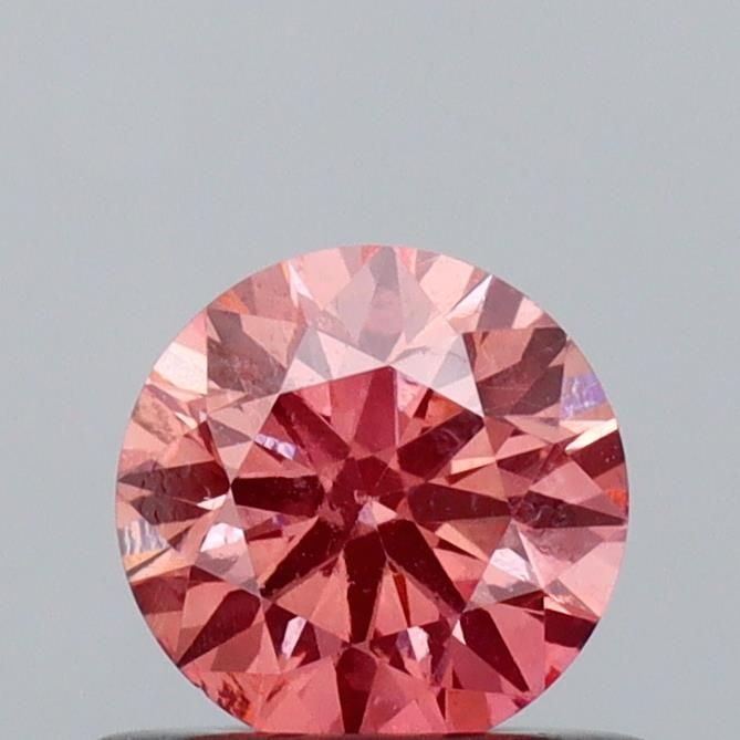 Loose Diamond - ROUND 0.5ct Fancy Vivid Orange Pink VS1: Loose Diamond - ROUND 0.5ct Fancy Vivid Orange Pink VS1 Source: This is a real non-mined Diamond that has been grown in a lab Shape: ROUND Carats: 0.5 Color: Fancy Vivid Orange Pink Certification: IGI