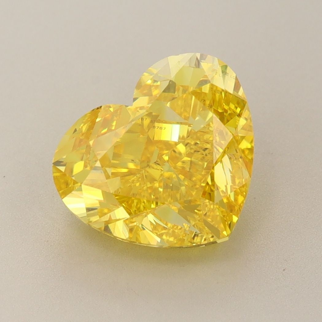 Loose Diamond - HEART 4.01ct Fancy Vivid Yellow VS1: Loose Diamond - HEART 4.01ct Fancy Vivid Yellow VS1 Source: This is a real non-mined Diamond that has been grown in a lab Shape: HEART Carats: 4.01 Color: Fancy Vivid Yellow Certification: IGI Video: