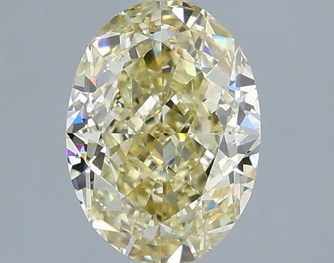 Loose Diamond - OVAL 1.54ct Fancy Yellow VVS2: Loose Diamond - OVAL 1.54ct Fancy Yellow VVS2 Source: This is a real non-mined Diamond that has been grown in a lab Shape: OVAL Carats: 1.54 Color: Fancy Yellow Certification: IGI Video:
