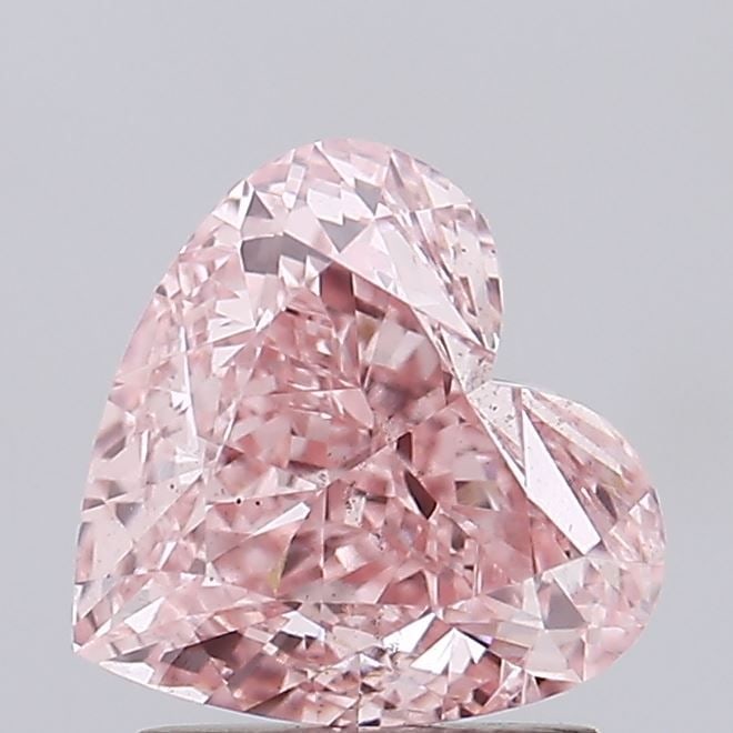 Loose Diamond - HEART 2.03ct Fancy Vivid Pink VS2: Loose Diamond - HEART 2.03ct Fancy Vivid Pink VS2 Source: This is a real non-mined Diamond that has been grown in a lab Shape: HEART Carats: 2.03 Color: Fancy Vivid Pink Certification: IGI Video: