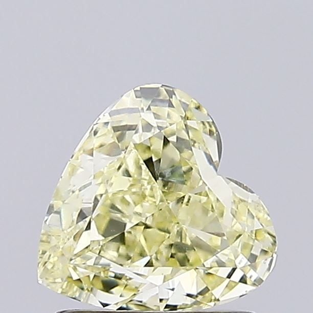 Loose Diamond - HEART 1.01ct Fancy Light Yellow VVS2: Loose Diamond - HEART 1.01ct Fancy Light Yellow VVS2 Source: This is a real non-mined Diamond that has been grown in a lab Shape: HEART Carats: 1.01 Color: Fancy Light Yellow Certification: IGI Video: