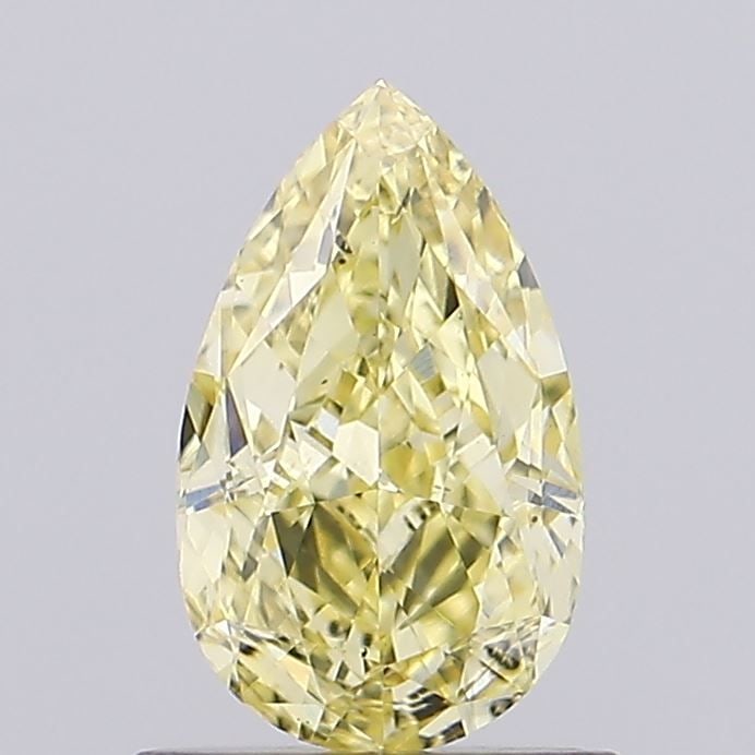Loose Diamond - PEAR 0.84ct Fancy Vivid Yellow VS2: Loose Diamond - PEAR 0.84ct Fancy Vivid Yellow VS2 Source: This is a real non-mined Diamond that has been grown in a lab Shape: PEAR Carats: 0.84 Color: Fancy Vivid Yellow Certification: IGI Video: