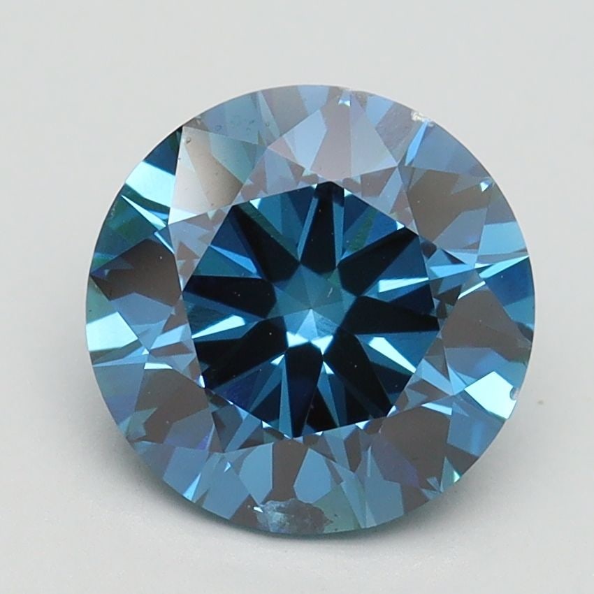 Loose Diamond - ROUND 2.3ct Fancy Vivid Blue SI1: Loose Diamond - ROUND 2.3ct Fancy Vivid Blue SI1 Source: This is a real non-mined Diamond that has been grown in a lab Shape: ROUND Carats: 2.3 Color: Fancy Vivid Blue Certification: IGI Video: