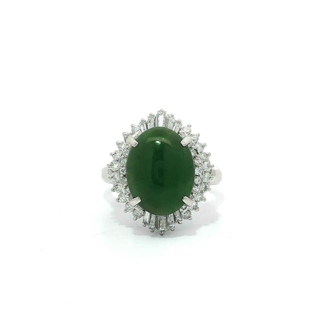 Classic Platinum GIA Certified 4.23ct Jade and Diamond Cocktail Ring: Classic Platinum GIA Certified 4.23ct Jade and Diamond Cocktail Ring This exquisite cocktail ring features a stunning natural Burma Spinach Green A Jade gemstone, elegantly set in solid platinum. The 