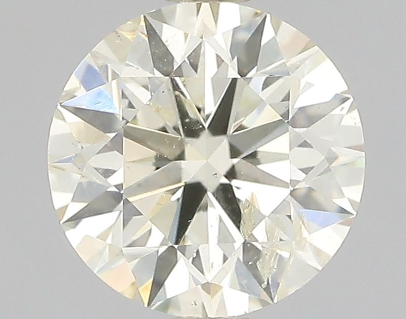 Loose Diamond - ROUND 0.7ct O-P I2: Loose Diamond - ROUND 0.7ct O-P I2 Source: Natural Shape: ROUND Carats: 0.7 Color: O-P Certification: NONE Video: