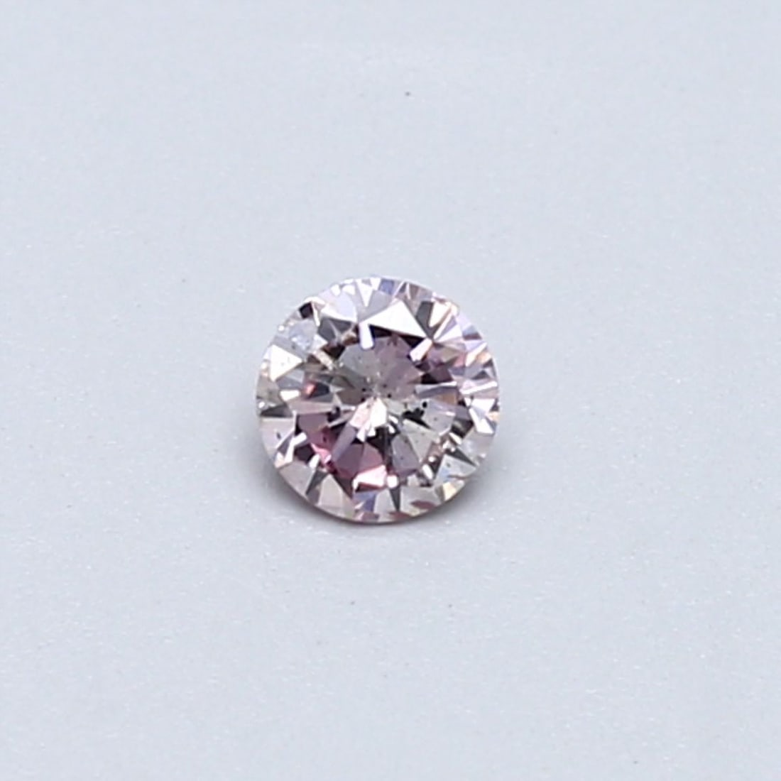Loose Diamond - ROUND 0.15ct Fancy Light Purplish Pink SI2: Loose Diamond - ROUND 0.15ct Fancy Light Purplish Pink SI2 Source: Natural Shape: ROUND Carats: 0.15 Color: Fancy Light Purplish Pink Certification: GIA Video: