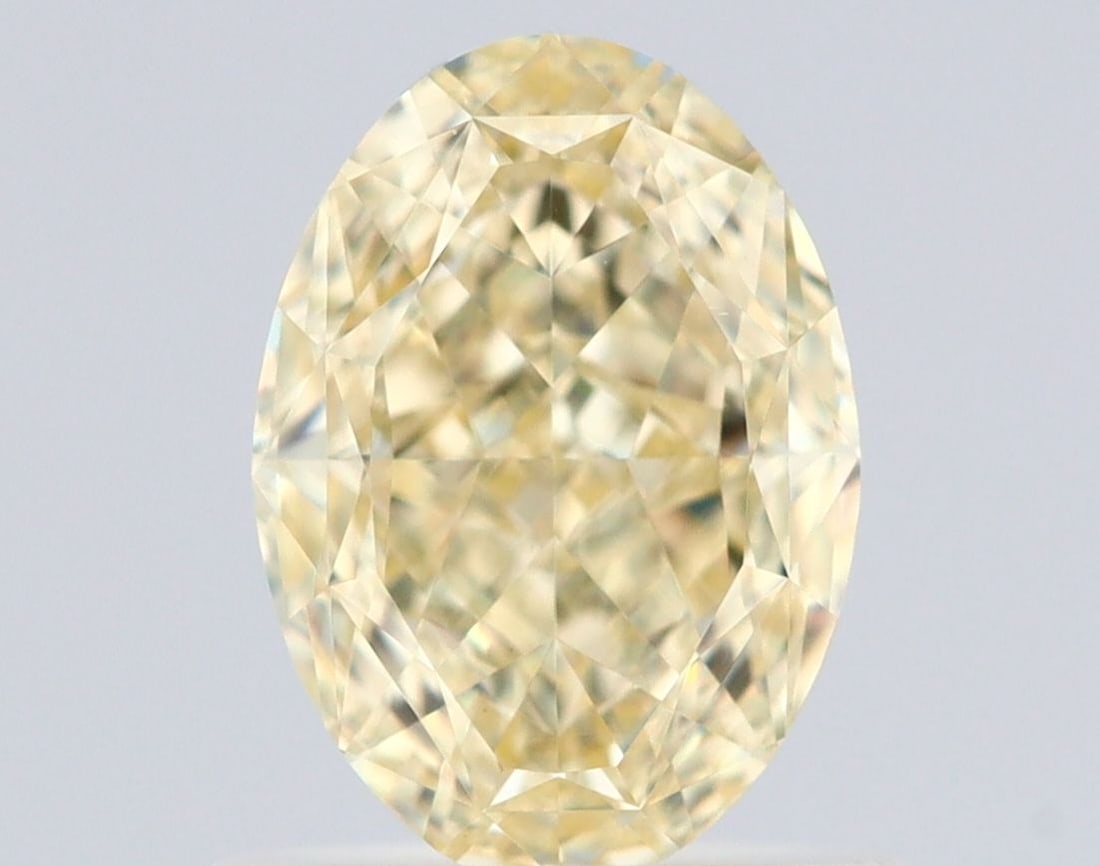 Loose Diamond - OVAL 1.02ct Fancy Light Yellow VS1: Loose Diamond - OVAL 1.02ct Fancy Light Yellow VS1 Source: Natural Shape: OVAL Carats: 1.02 Color: Fancy Light Yellow Certification: GIA Video:
