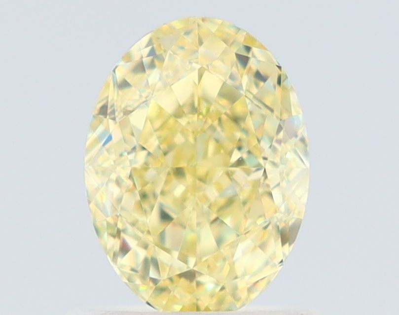 Loose Diamond - OVAL 1.03ct Fancy Light Yellow VS2: Loose Diamond - OVAL 1.03ct Fancy Light Yellow VS2 Source: Natural Shape: OVAL Carats: 1.03 Color: Fancy Light Yellow Certification: GIA The Diamond Depot Guarantee: All items in this auction are guar