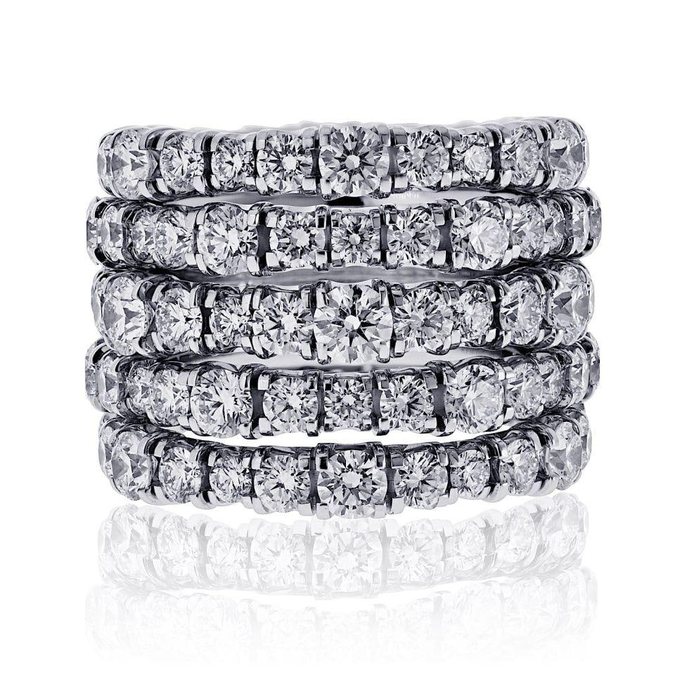Cartier 18K White Gold Lignes Essentielles Multirow Ring: Cartier 18K White Gold Lignes Essentielles Multirow Ring This exquisite Cartier Lignes Essentielles ring is crafted from 18K white gold and weighs approximately 18.2 grams. Designed with architectural