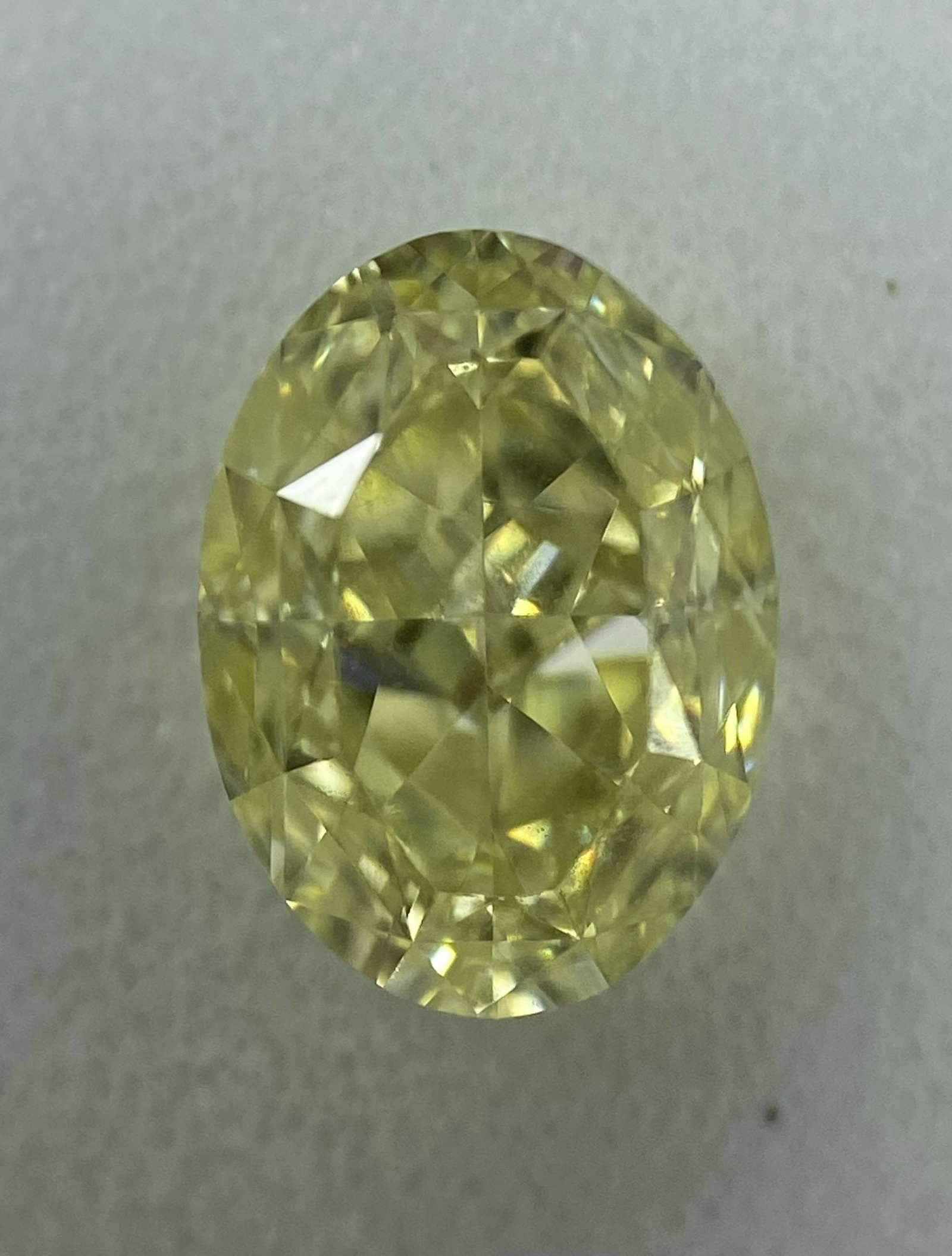 Loose Diamond - OVAL 1.04ct Fancy Light Yellow VVS1: Loose Diamond - OVAL 1.04ct Fancy Light Yellow VVS1 Source: Natural Shape: OVAL Carats: 1.04 Color: Fancy Light Yellow Certification: GIA The Diamond Depot Guarantee: All items in this auction are gua