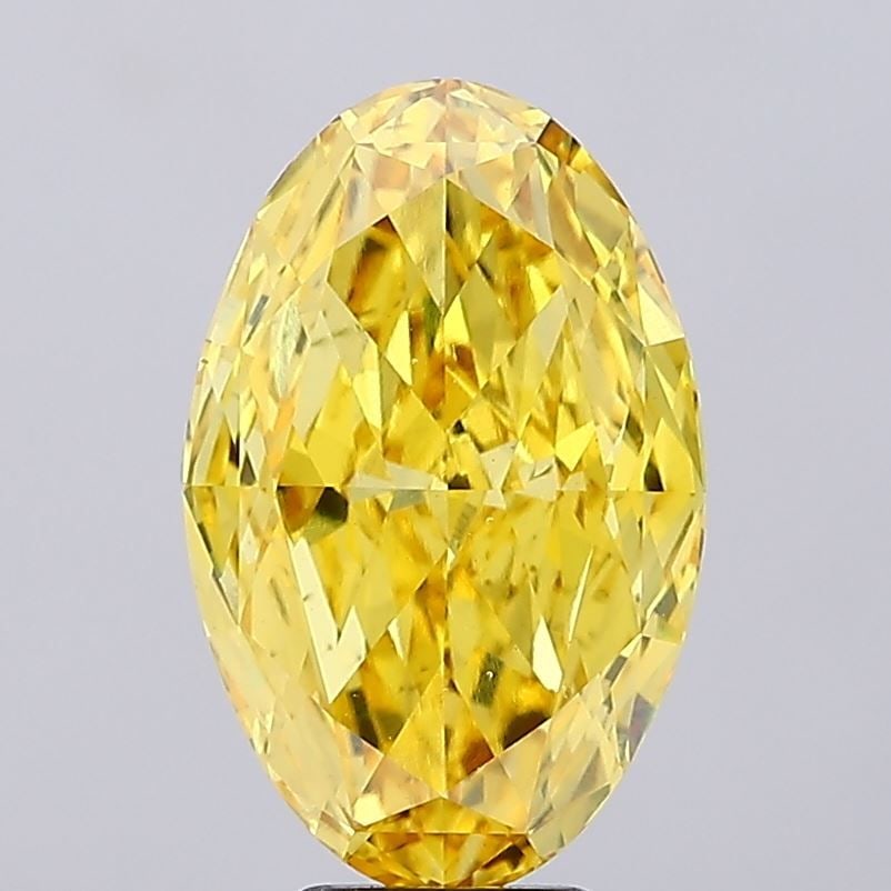 Loose Diamond - OVAL 7.0ct Fancy Vivid Yellow VS2: Loose Diamond - OVAL 7.0ct Fancy Vivid Yellow VS2 Source: This is a real non-mined Diamond that has been grown in a lab Shape: OVAL Carats: 7.0 Color: Fancy Vivid Yellow Certification: IGI Video: