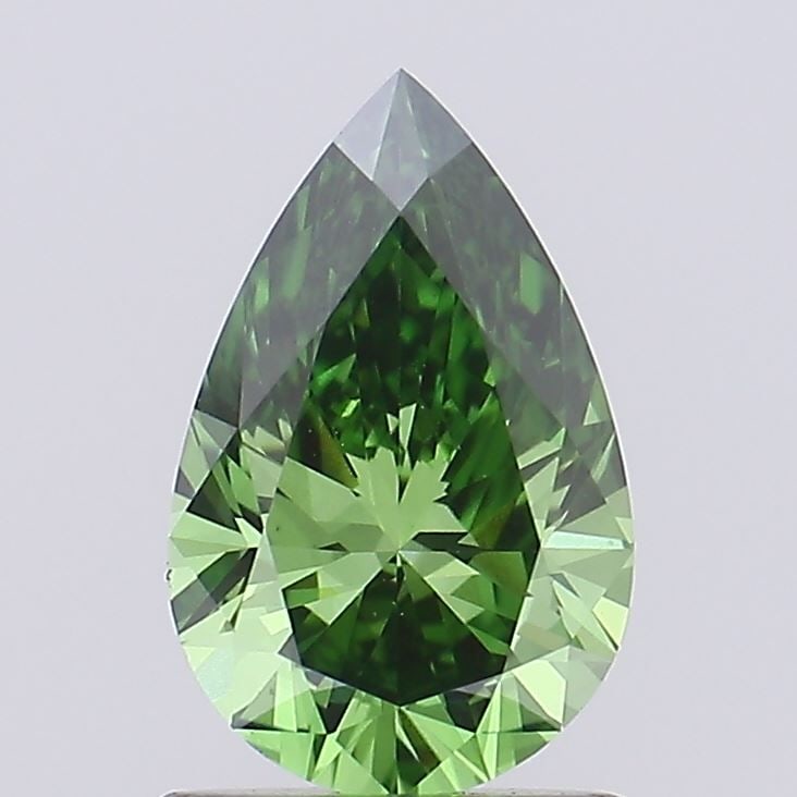 Loose Diamond - PEAR 0.92ct Fancy Vivid Green VS1: Loose Diamond - PEAR 0.92ct Fancy Vivid Green VS1 Source: This is a real non-mined Diamond that has been grown in a lab Shape: PEAR Carats: 0.92 Color: Fancy Vivid Green Certification: IGI Video: