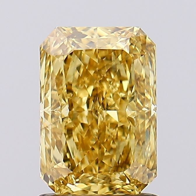 Loose Diamond - RADIANT 1.38ct Fancy Vivid Yellow VS1: Loose Diamond - RADIANT 1.38ct Fancy Vivid Yellow VS1 Source: This is a real non-mined Diamond that has been grown in a lab Shape: RADIANT Carats: 1.38 Color: Fancy Vivid Yellow Certification: IGI Vid