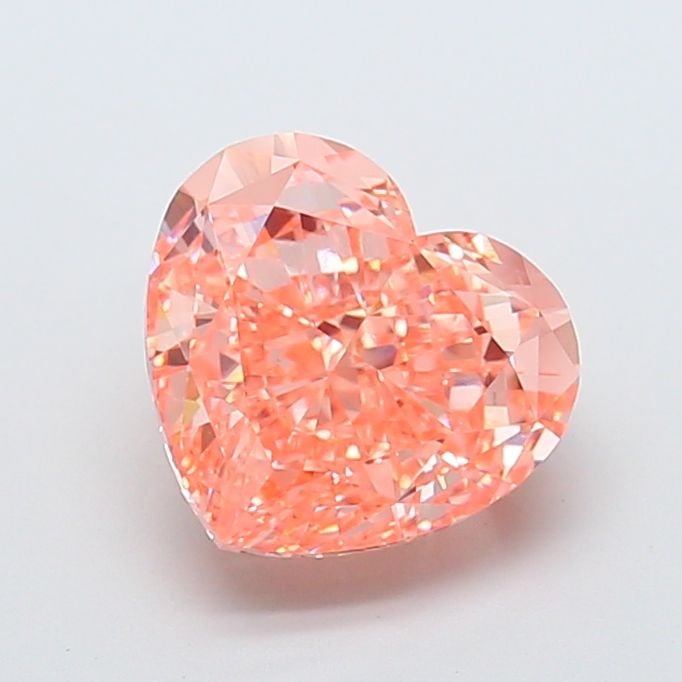 Loose Diamond - HEART 4.53ct Fancy Vivid Orange Pink VS1: Loose Diamond - HEART 4.53ct Fancy Vivid Orange Pink VS1 Source: This is a real non-mined Diamond that has been grown in a lab Shape: HEART Carats: 4.53 Color: Fancy Vivid Orange Pink Certification: I