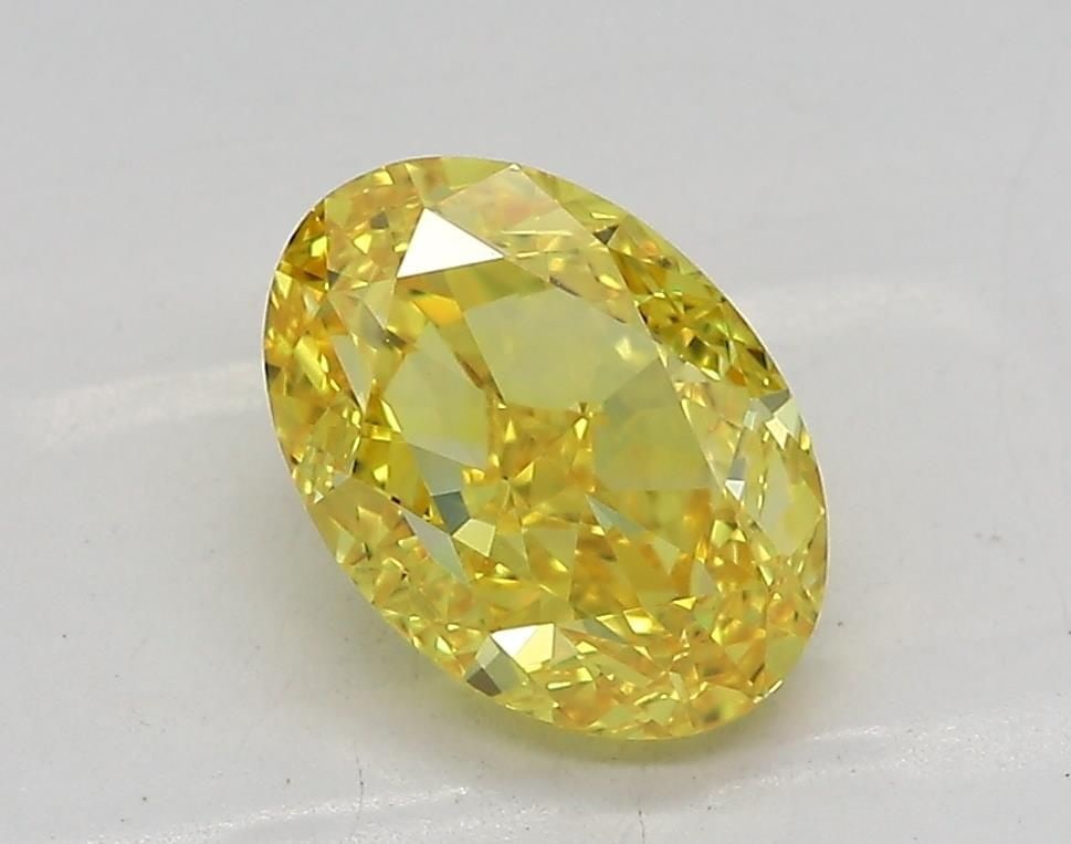 Loose Diamond - OVAL 1.59ct Fancy Vivid Yellow IF: Loose Diamond - OVAL 1.59ct Fancy Vivid Yellow IF Source: This is a real non-mined Diamond that has been grown in a lab Shape: OVAL Carats: 1.59 Color: Fancy Vivid Yellow Certification: IGI Video: