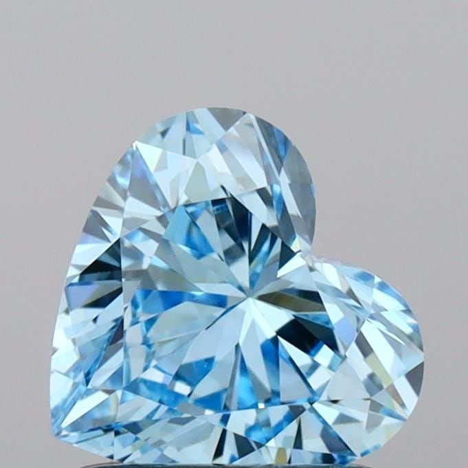 Loose Diamond - HEART 0.96ct Fancy Vivid Blue VVS2: Loose Diamond - HEART 0.96ct Fancy Vivid Blue VVS2 Source: This is a real non-mined Diamond that has been grown in a lab Shape: HEART Carats: 0.96 Color: Fancy Vivid Blue Certification: IGI Video:
