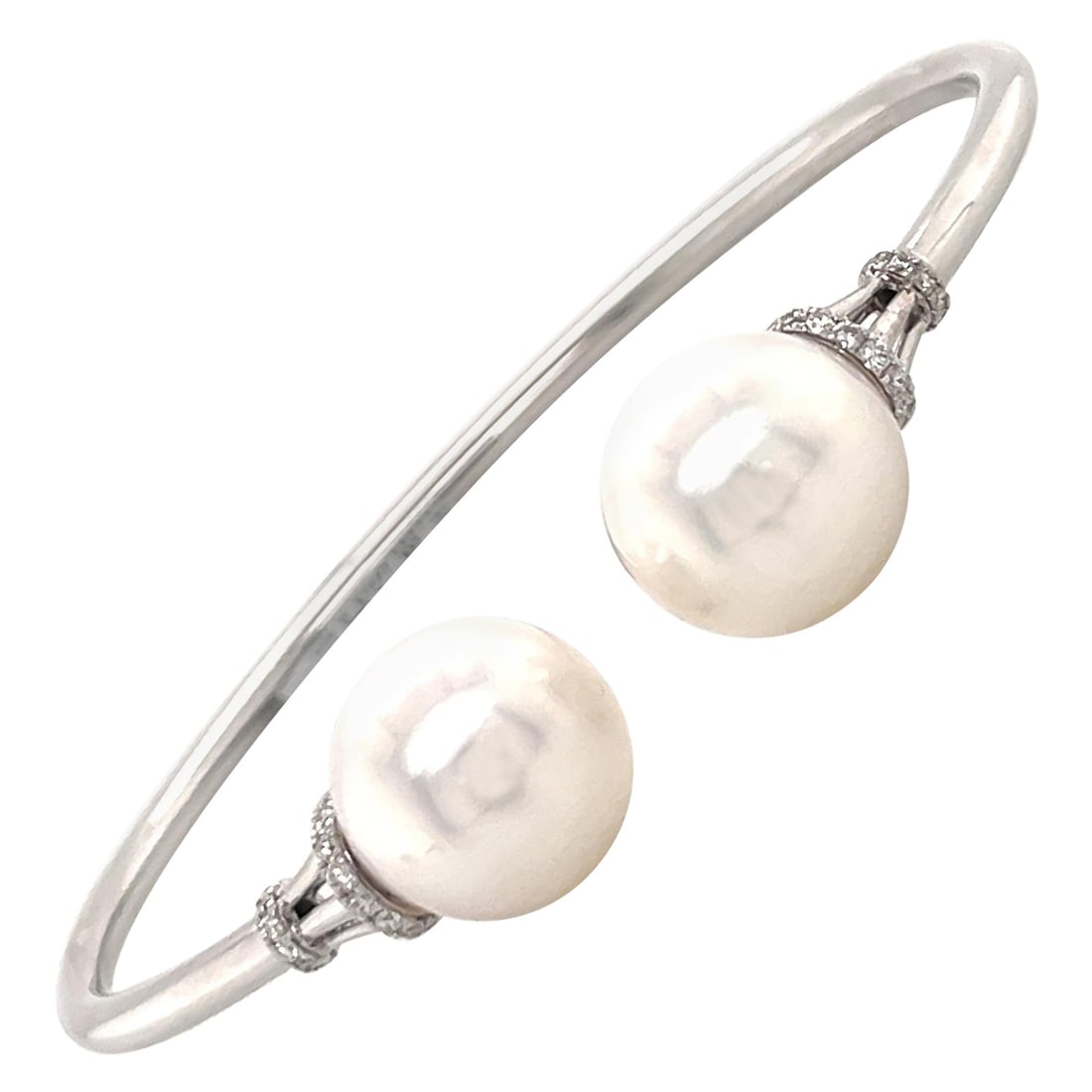 Harbor Diamonds 14K White Gold South Sea Pearl Bangle Bracelet with Diamonds: Harbor Diamonds 14K White Gold South Sea Pearl Bangle Bracelet with Diamonds This exquisite 14 Karat White Gold bangle bracelet showcases the elegance of two stunning South Sea Pearls, each measuring 