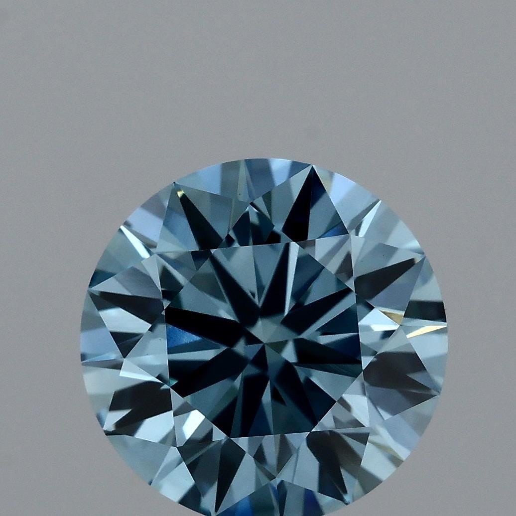 Ideal Loose Diamond - ROUND 2.01ct Fancy Vivid Blue VVS2: Ideal Loose Diamond - ROUND 2.01ct Fancy Vivid Blue VVS2 Source: This is a real non-mined Diamond that has been grown in a lab Shape: ROUND Carats: 2.01 Color: Fancy Vivid Blue Certification: IGI Vide