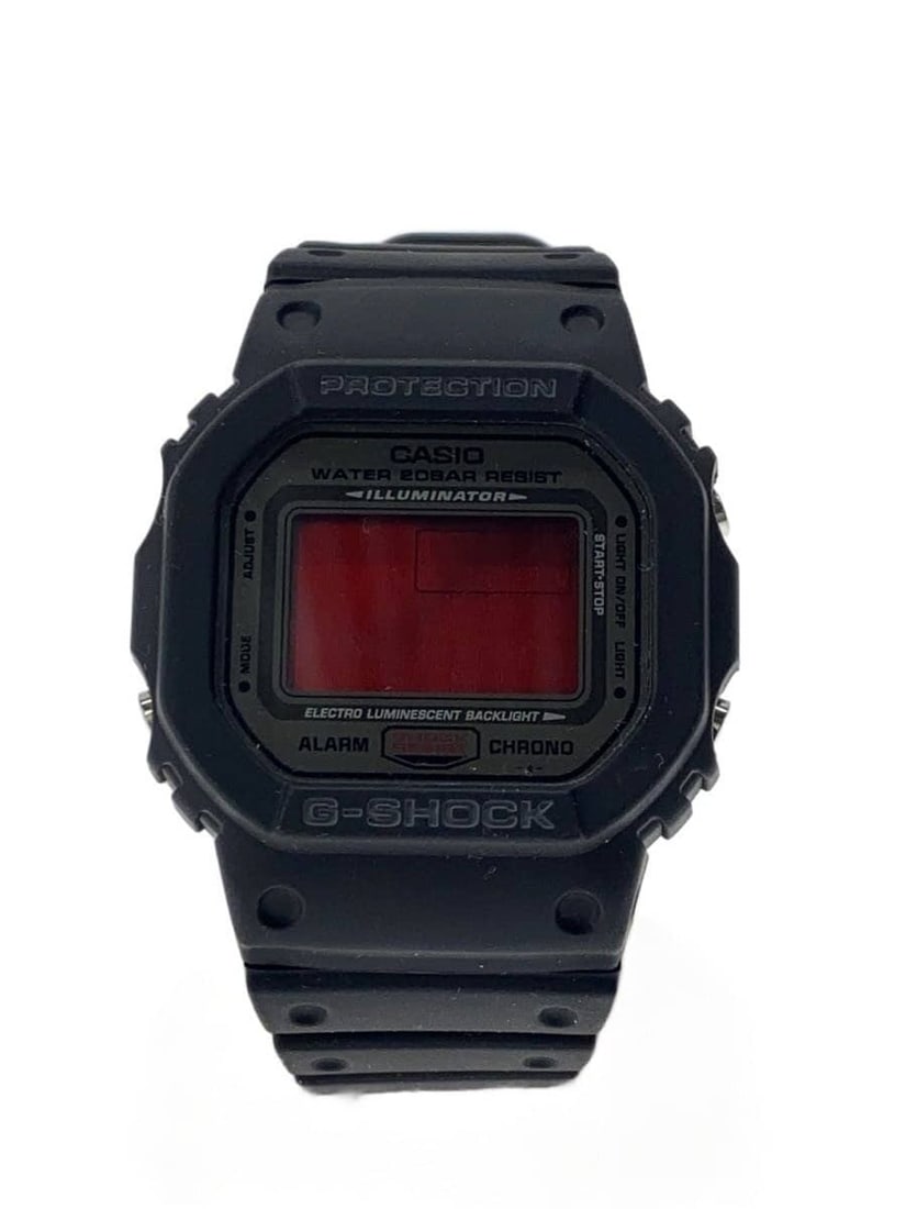 Casio DW-5000ML-1JF G Shock Black Wristwatch: Casio DW-5000ML-1JF G Shock Black Wristwatch This is a pre-owned CASIO G-SHOCK DW-5000ML-1JF men's wristwatch, featuring a durable black design. The watch shows slight signs of use and offers classic 