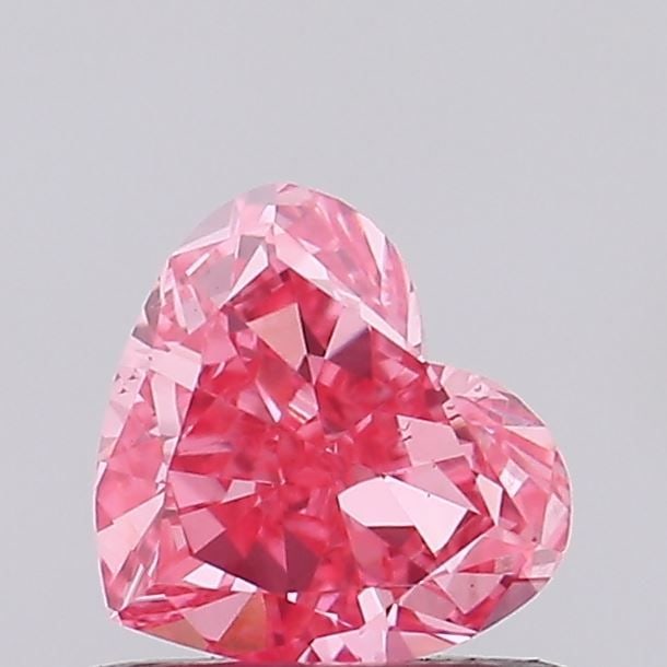 Loose Diamond - HEART 0.53ct Fancy Vivid Pink VS1: Loose Diamond - HEART 0.53ct Fancy Vivid Pink VS1 Source: This is a real non-mined Diamond that has been grown in a lab Shape: HEART Carats: 0.53 Color: Fancy Vivid Pink Certification: IGI Video: