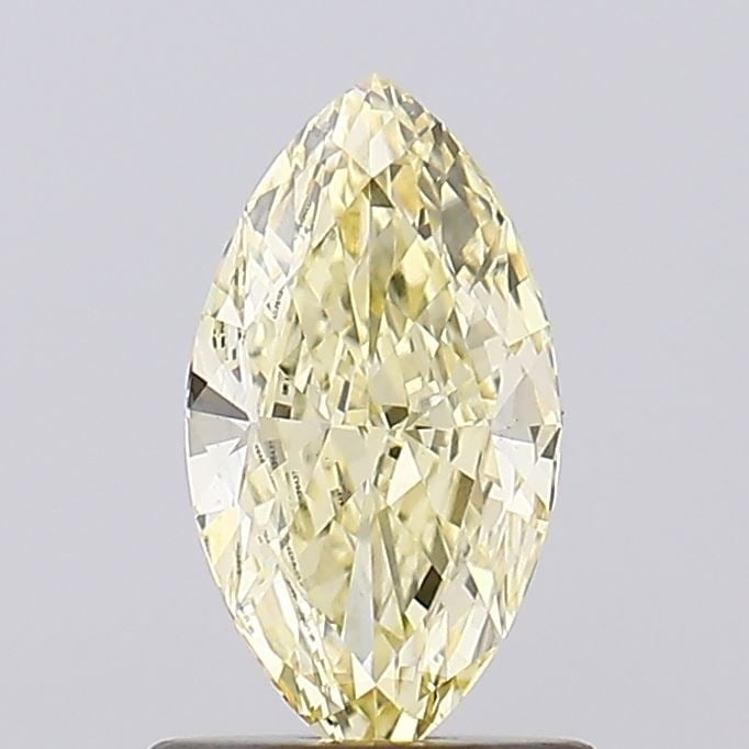 Loose Diamond - MARQUISE 1.01ct Fancy Yellow VS1: Loose Diamond - MARQUISE 1.01ct Fancy Yellow VS1 Source: This is a real non-mined Diamond that has been grown in a lab Shape: MARQUISE Carats: 1.01 Color: Fancy Yellow Certification: IGI Video: