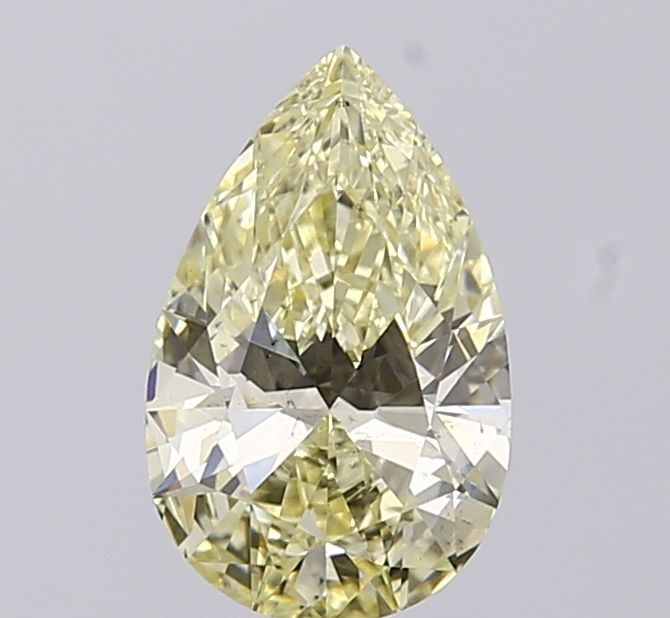 Loose Diamond - PEAR 1.28ct Fancy Yellow VS2: Loose Diamond - PEAR 1.28ct Fancy Yellow VS2 Source: This is a real non-mined Diamond that has been grown in a lab Shape: PEAR Carats: 1.28 Color: Fancy Yellow Certification: IGI Video: