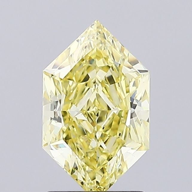 Loose Diamond - HEXAGONAL 1.52ct Fancy Yellow VS1: Loose Diamond - HEXAGONAL 1.52ct Fancy Yellow VS1 Source: This is a real non-mined Diamond that has been grown in a lab Shape: HEXAGONAL Carats: 1.52 Color: Fancy Yellow Certification: IGI Video: