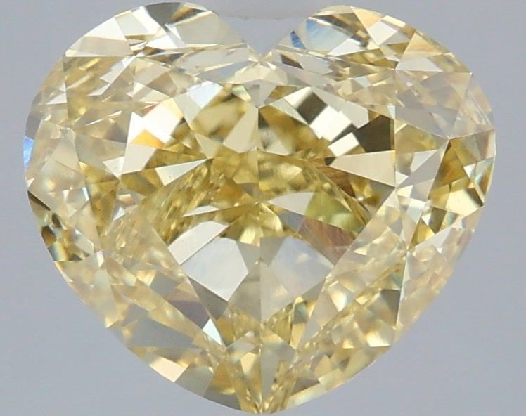 Loose Diamond - HEART 4.08ct Fancy Yellow VS1: Loose Diamond - HEART 4.08ct Fancy Yellow VS1 Source: This is a real non-mined Diamond that has been grown in a lab Shape: HEART Carats: 4.08 Color: Fancy Yellow Certification: IGI Video: