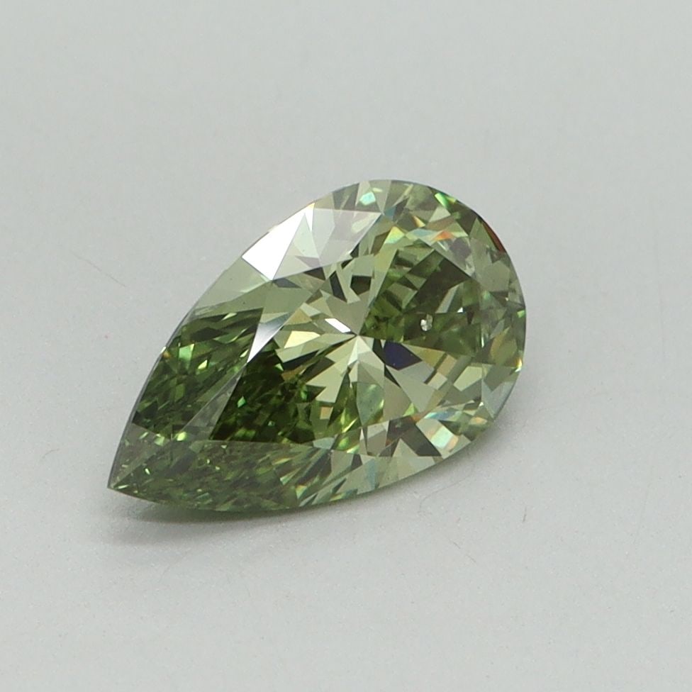 Loose Diamond - PEAR 1.0ct Fancy Vivid Green VS2: Loose Diamond - PEAR 1.0ct Fancy Vivid Green VS2 Source: This is a real non-mined Diamond that has been grown in a lab Shape: PEAR Carats: 1.0 Color: Fancy Vivid Green Certification: IGI Video: