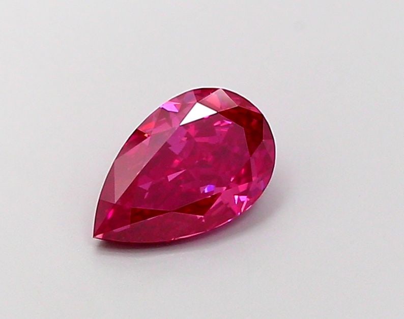 Loose Diamond - PEAR 1.53ct Fancy Vivid Pink VS2: Loose Diamond - PEAR 1.53ct Fancy Vivid Pink VS2 Source: This is a real non-mined Diamond that has been grown in a lab Shape: PEAR Carats: 1.53 Color: Fancy Vivid Pink Certification: IGI Video: Video