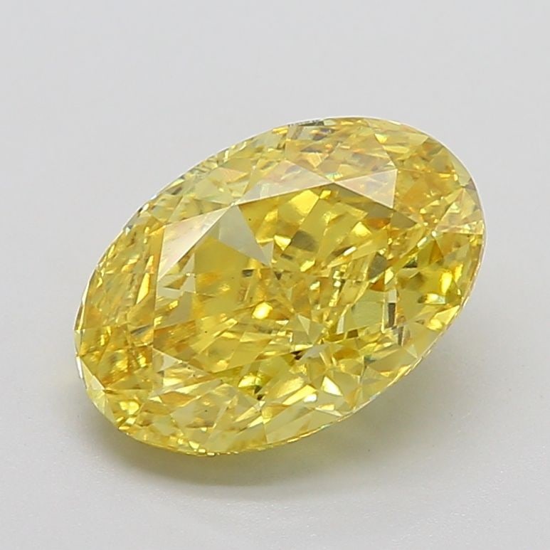 Loose Diamond - OVAL 5.36ct Fancy Vivid Yellow VS1: Loose Diamond - OVAL 5.36ct Fancy Vivid Yellow VS1 Source: This is a real non-mined Diamond that has been grown in a lab Shape: OVAL Carats: 5.36 Color: Fancy Vivid Yellow Certification: IGI Video: