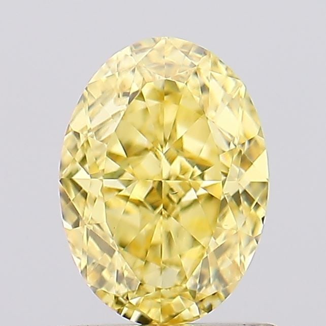 Loose Diamond - OVAL 1.02ct Fancy Vivid Yellow VS2: Loose Diamond - OVAL 1.02ct Fancy Vivid Yellow VS2 Source: This is a real non-mined Diamond that has been grown in a lab Shape: OVAL Carats: 1.02 Color: Fancy Vivid Yellow Certification: IGI Video: