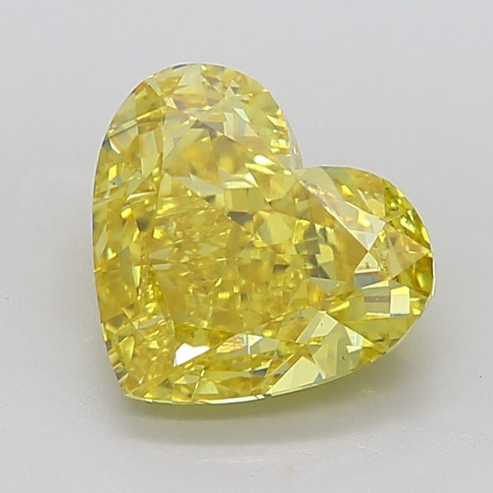 Loose Diamond - HEART 6.06ct Fancy Vivid Yellow VS1: Loose Diamond - HEART 6.06ct Fancy Vivid Yellow VS1 Source: This is a real non-mined Diamond that has been grown in a lab Shape: HEART Carats: 6.06 Color: Fancy Vivid Yellow Certification: IGI Video: