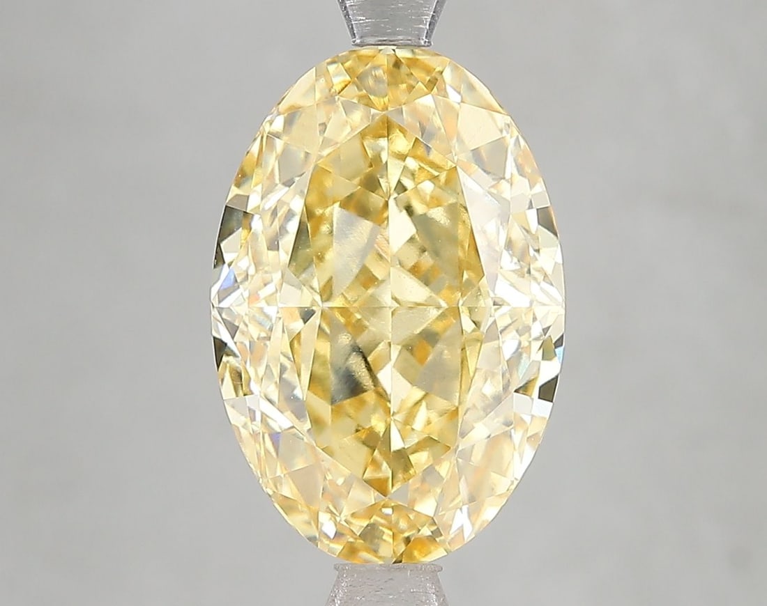 Loose Diamond - OVAL 5.16ct Fancy Intense Yellow VVS2: Loose Diamond - OVAL 5.16ct Fancy Intense Yellow VVS2 Source: This is a real non-mined Diamond that has been grown in a lab Shape: OVAL Carats: 5.16 Color: Fancy Intense Yellow Certification: IGI Vide