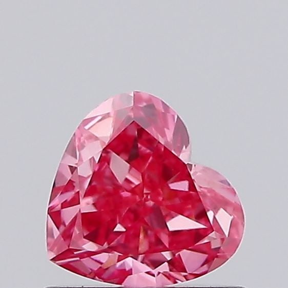 Loose Diamond - HEART 0.6ct Fancy Vivid Pink VS1: Loose Diamond - HEART 0.6ct Fancy Vivid Pink VS1 Source: This is a real non-mined Diamond that has been grown in a lab Shape: HEART Carats: 0.6 Color: Fancy Vivid Pink Certification: IGI Video: