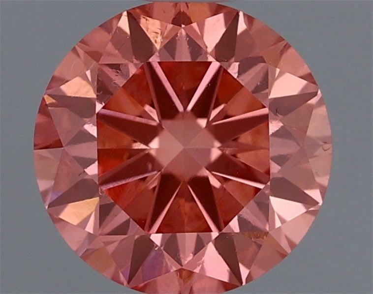 Loose Diamond - ROUND 0.71ct Fancy Vivid Purple Pink VS2: Loose Diamond - ROUND 0.71ct Fancy Vivid Purple Pink VS2 Source: This is a real non-mined Diamond that has been grown in a lab Shape: ROUND Carats: 0.71 Color: Fancy Vivid Purple Pink Certification: I