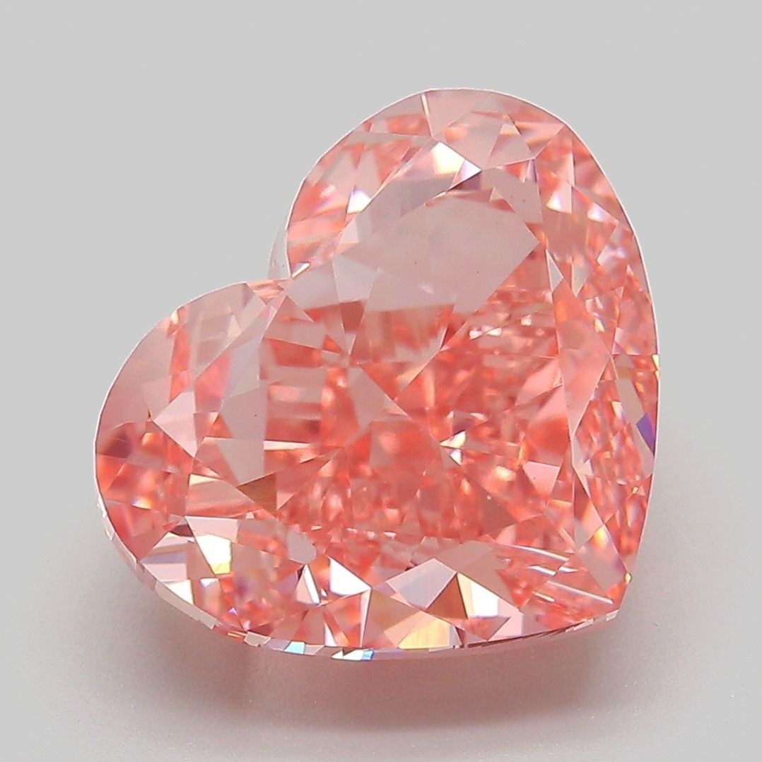 Loose Diamond - HEART 7.52ct Fancy Vivid Pink VVS2: Loose Diamond - HEART 7.52ct Fancy Vivid Pink VVS2 Source: This is a real non-mined Diamond that has been grown in a lab Shape: HEART Carats: 7.52 Color: Fancy Vivid Pink Certification: IGI Video:
