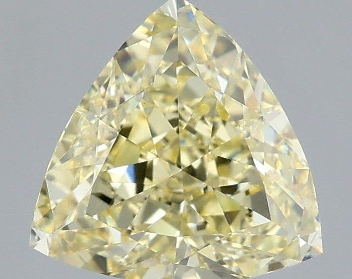 Loose Diamond - TRIANGULAR 2.01ct Fancy Yellow VVS2: Loose Diamond - TRIANGULAR 2.01ct Fancy Yellow VVS2 Source: This is a real non-mined Diamond that has been grown in a lab Shape: TRIANGULAR Carats: 2.01 Color: Fancy Yellow Certification: IGI Video: