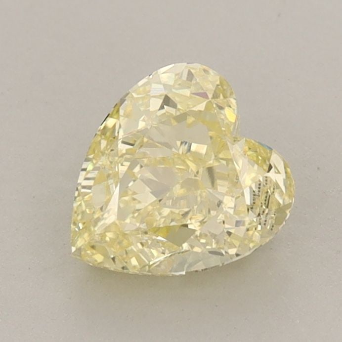 Loose Diamond - HEART 1.05ct Fancy Intense Yellow VS1: Loose Diamond - HEART 1.05ct Fancy Intense Yellow VS1 Source: This is a real non-mined Diamond that has been grown in a lab Shape: HEART Carats: 1.05 Color: Fancy Intense Yellow Certification: IGI Vid