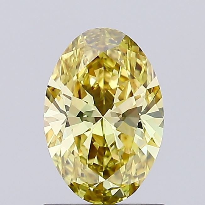 Loose Diamond - OVAL 0.83ct Fancy Yellow VS1: Loose Diamond - OVAL 0.83ct Fancy Yellow VS1 Source: This is a real non-mined Diamond that has been grown in a lab Shape: OVAL Carats: 0.83 Color: Fancy Yellow Certification: IGI Video: