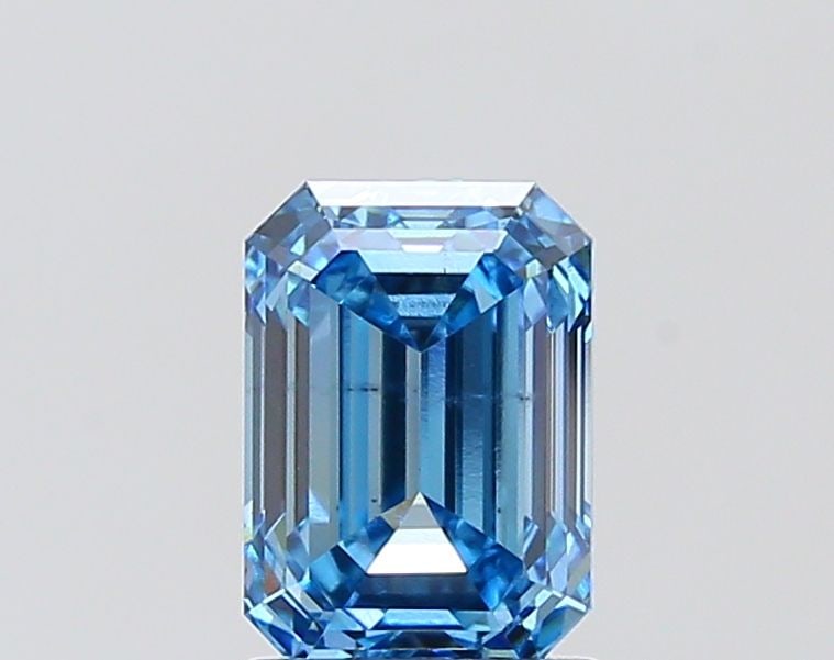 Loose Diamond - EMERALD 1.97ct Fancy Vivid Blue VS2: Loose Diamond - EMERALD 1.97ct Fancy Vivid Blue VS2 Source: This is a real non-mined Diamond that has been grown in a lab Shape: EMERALD Carats: 1.97 Color: Fancy Vivid Blue Certification: IGI The Dia