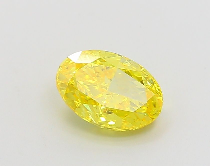 Loose Diamond - OVAL 1.5ct Fancy Vivid Yellow VS1: Loose Diamond - OVAL 1.5ct Fancy Vivid Yellow VS1 Source: This is a real non-mined Diamond that has been grown in a lab Shape: OVAL Carats: 1.5 Color: Fancy Vivid Yellow Certification: IGI Video: