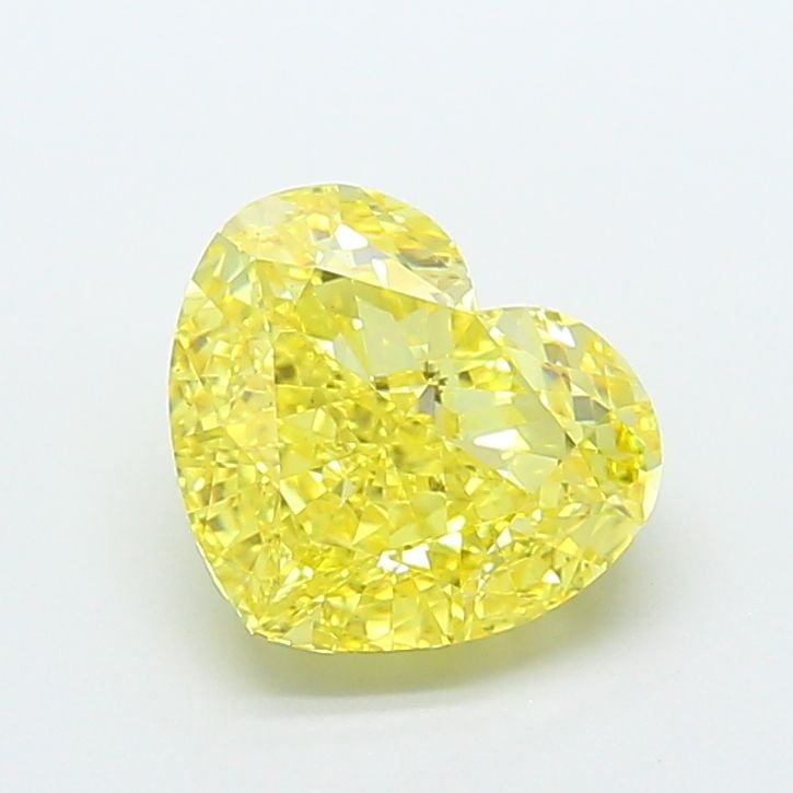 Loose Diamond - HEART 4.64ct Fancy Vivid Yellow VS1: Loose Diamond - HEART 4.64ct Fancy Vivid Yellow VS1 Source: This is a real non-mined Diamond that has been grown in a lab Shape: HEART Carats: 4.64 Color: Fancy Vivid Yellow Certification: IGI Video: