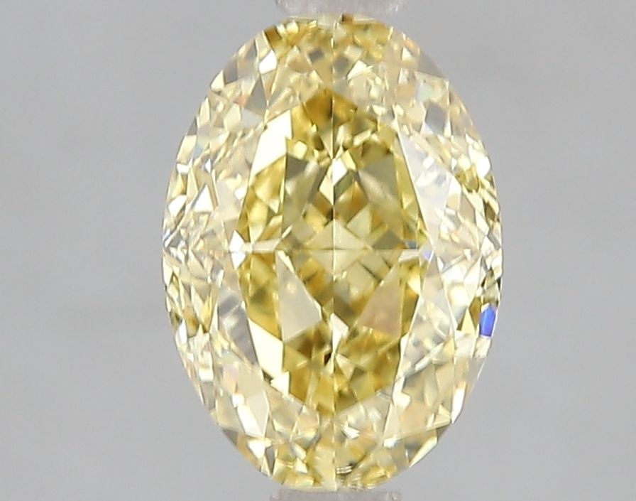 Loose Diamond - OVAL 2.06ct Fancy Vivid Yellow VS2: Loose Diamond - OVAL 2.06ct Fancy Vivid Yellow VS2 Source: This is a real non-mined Diamond that has been grown in a lab Shape: OVAL Carats: 2.06 Color: Fancy Vivid Yellow Certification: IGI Video: