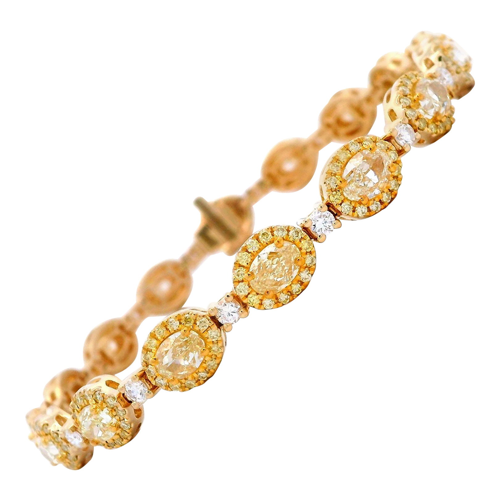 8.20ct Oval Yellow Diamond Bracelet 18k Gold: 8.20ct Oval Yellow Diamond Bracelet 18k Gold This stunning contemporary bracelet features a total of 8.20 carats of exquisite diamonds set in luxurious 18k yellow gold. The bracelet showcases 16 oval 