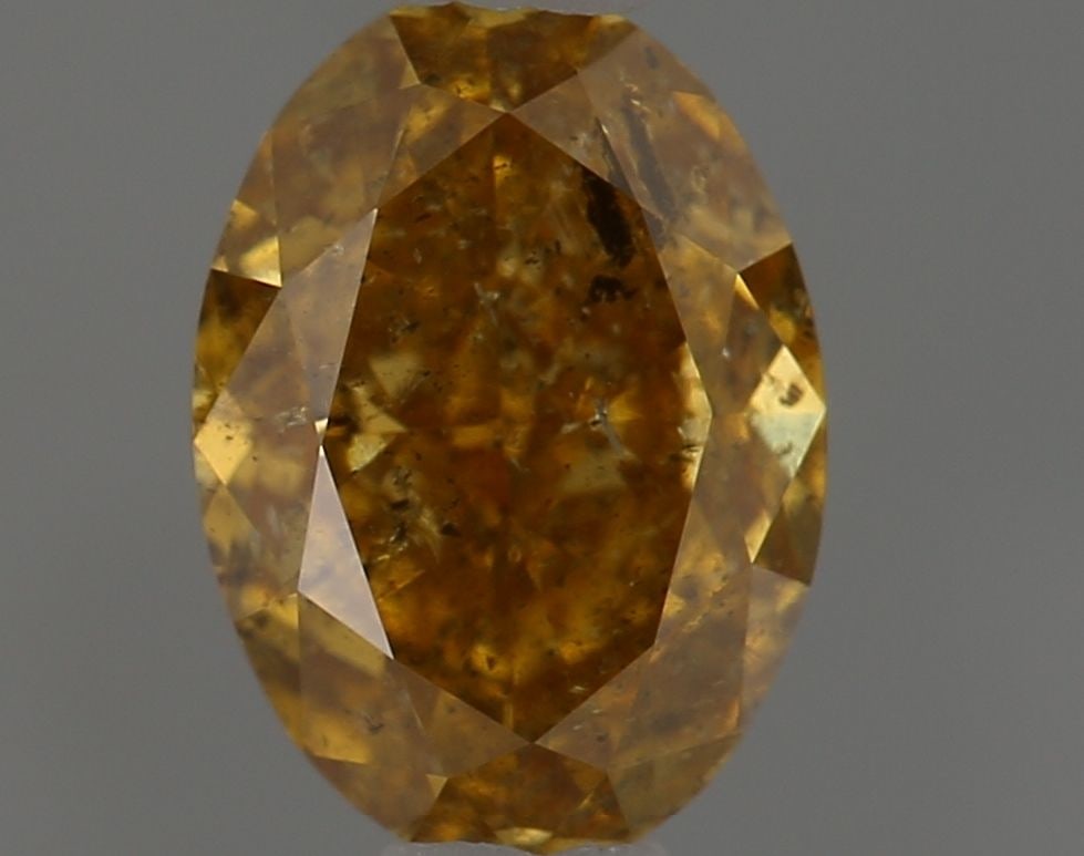 Loose Diamond - OVAL 0.7ct Fancy Deep Brownish Orangey Yellow I2: Loose Diamond - OVAL 0.7ct Fancy Deep Brownish Orangey Yellow I2 Source: Natural Shape: OVAL Carats: 0.7 Color: Fancy Deep Brownish Orangey Yellow Certification: NONE Video: