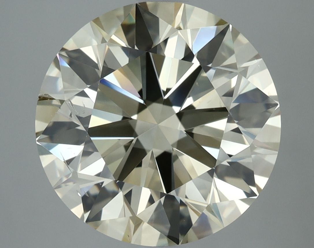 Loose Diamond - ROUND 5.02ct S-T SI1: Loose Diamond - ROUND 5.02ct S-T SI1 Source: Natural Shape: ROUND Carats: 5.02 Color: S-T Certification: GIA The Diamond Depot Guarantee: All items in this auction are guaranteed to be 100% authentic.