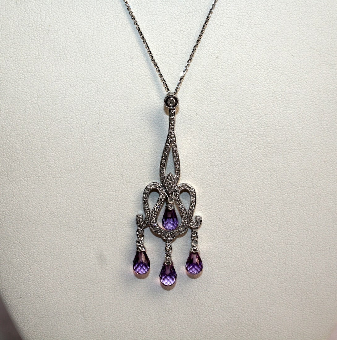 French 14K White Gold Necklace with Amethyst Pendant and Platinum Detail: French 14K White Gold Necklace with Amethyst Pendant and Platinum Detail This exquisite French necklace showcases a stunning design crafted from 14K white gold and platinum, featuring an elegant Ameth
