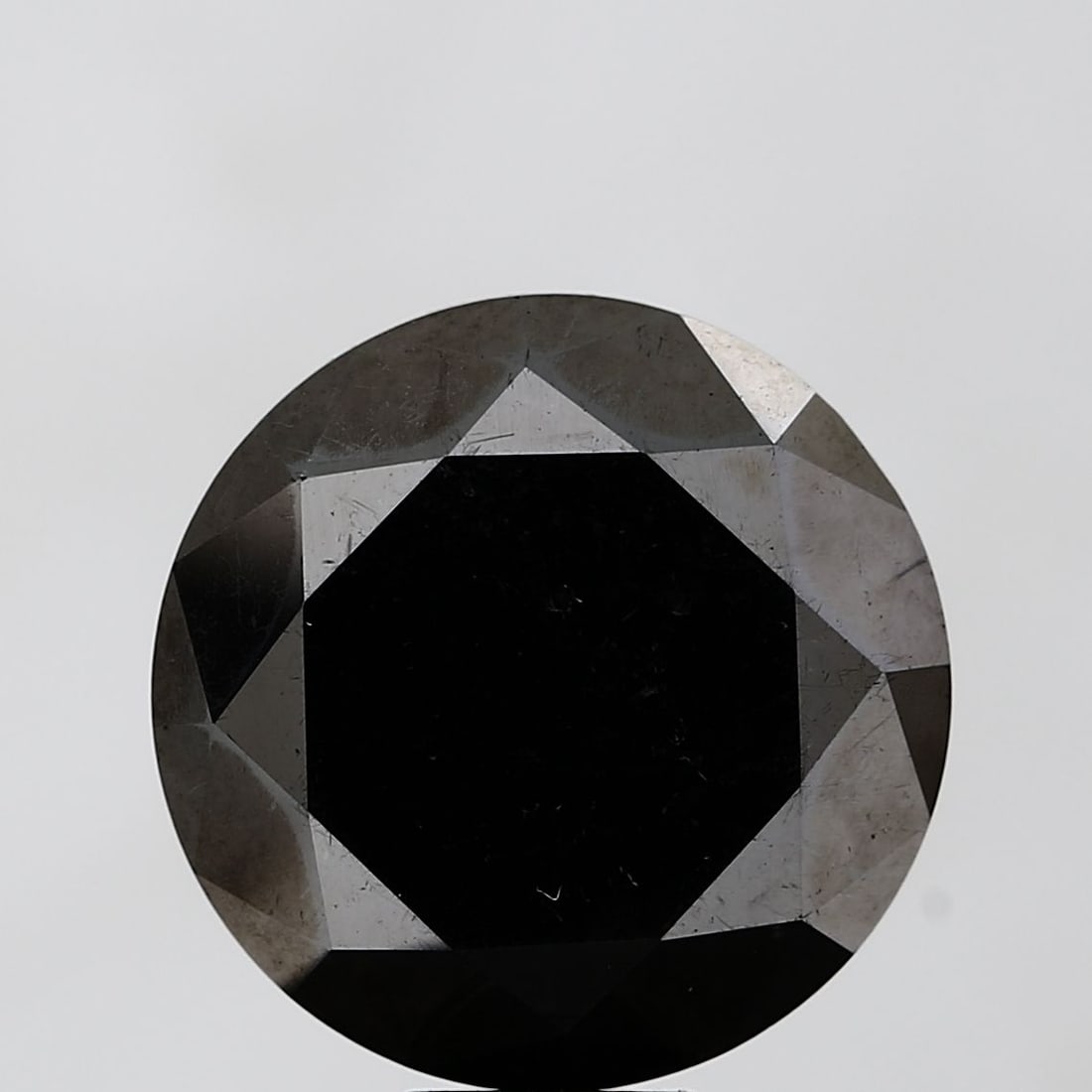 Loose Diamond - ROUND 12.95ct Fancy Black VVS2: Loose Diamond - ROUND 12.95ct Fancy Black VVS2 Source: Natural Shape: ROUND Carats: 12.95 Color: Fancy Black Certification: NONE Video: